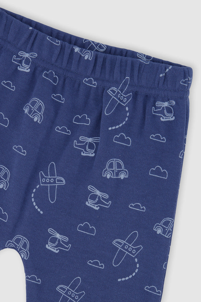 Close-up detail of the Deux par Deux set with sky blue top and deeper blue airplane and cloud print pants, view 5