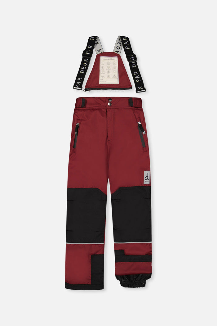 Burgundy Deux par Deux TEKNIK snow pants with black knee panels and suspenders, front view