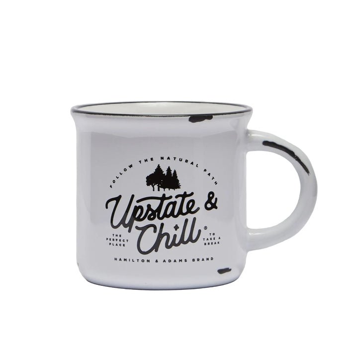 White mug with black text and handle on a light gray background