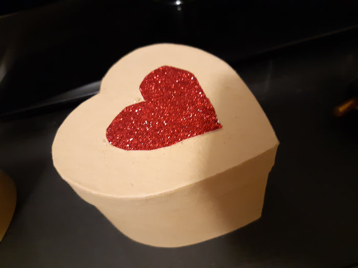 decorated heart-shaped box
