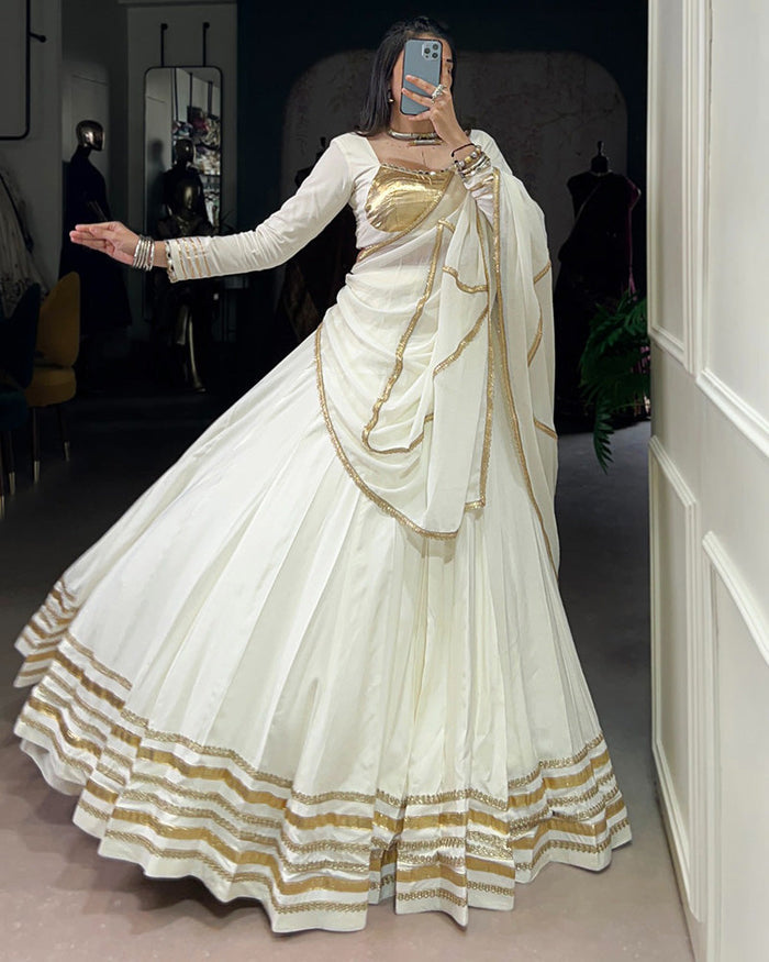 Alluring White Mirror Laced Navratri Wear Lehenga With Peplum Top