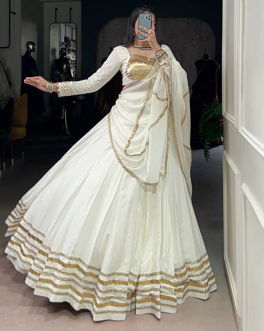 Alluring White Mirror Laced Navratri Wear Lehenga With Peplum Top