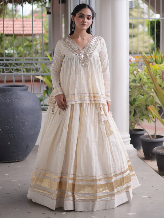 Alluring White Mirror Laced Navratri Wear Lehenga With Peplum Top