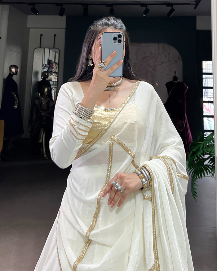 Alluring White Mirror Laced Navratri Wear Lehenga With Peplum Top
