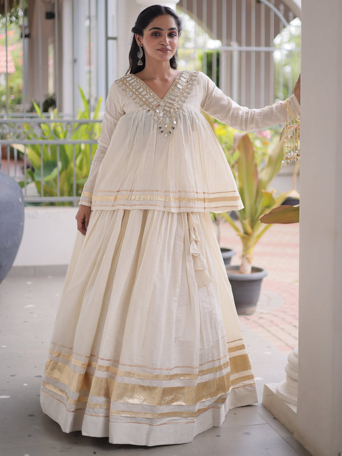 Alluring White Mirror Laced Navratri Wear Lehenga With Peplum Top