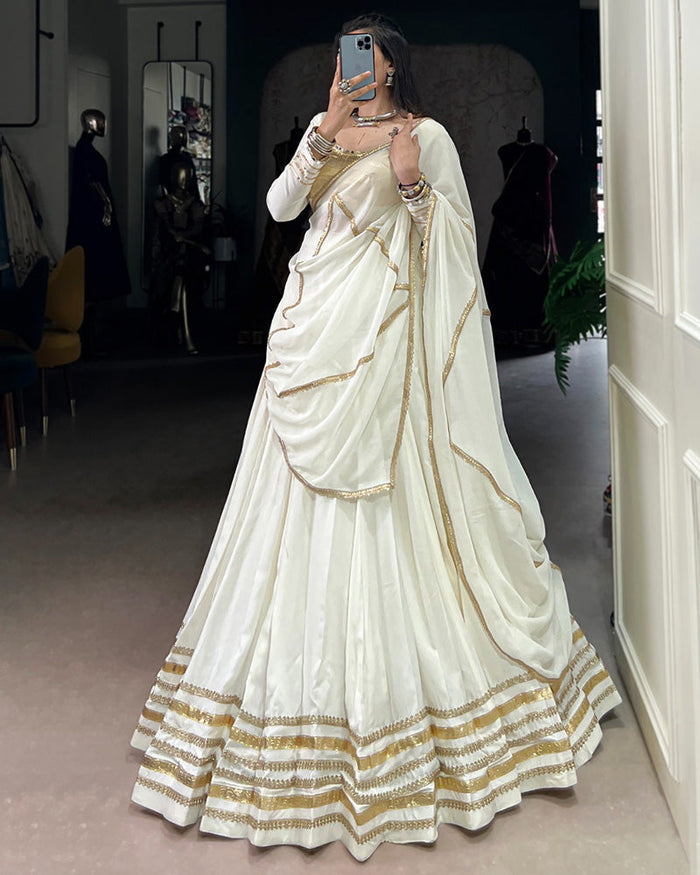 Alluring White Mirror Laced Navratri Wear Lehenga With Peplum Top