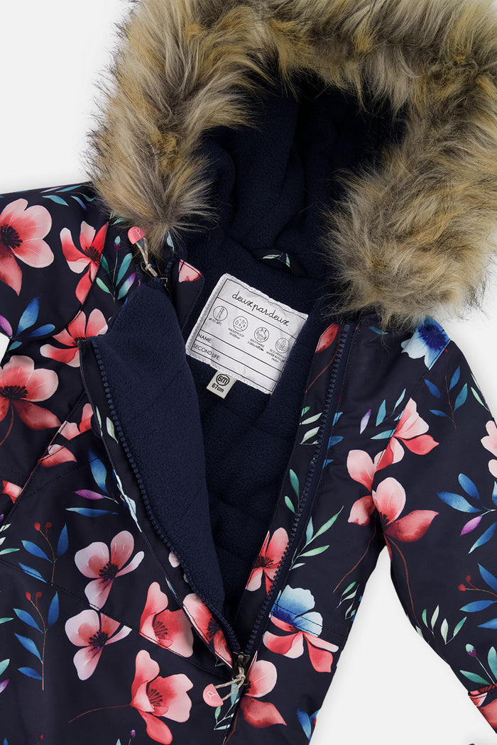 Close-up of the faux-fur trimmed hood and fleece-lined body of the blue floral print snowsuit