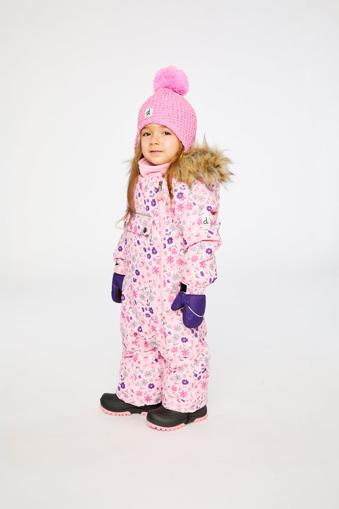 Side view of a child wearing the pink mini flower print car seat snowsuit