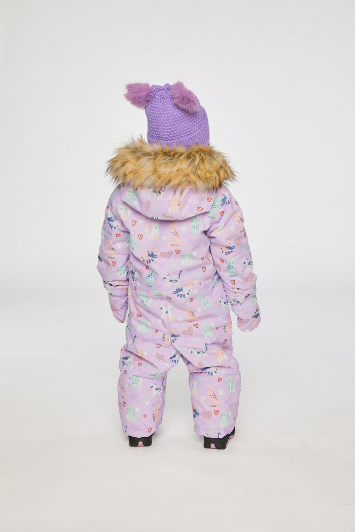 Back view of a child in the purple cat print snowsuit with faux-fur trimmed hood