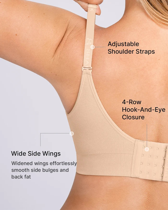 Back view of a beige wireless push-up bra featuring back smoothing wings to eliminate bulges.
