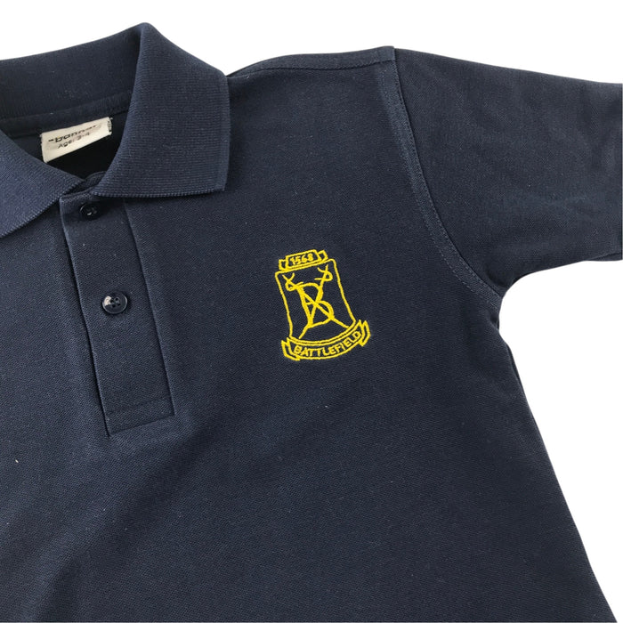 Second-hand Battlefield Primary School navy blue polo shirt, flat lay view with embroidered badge.