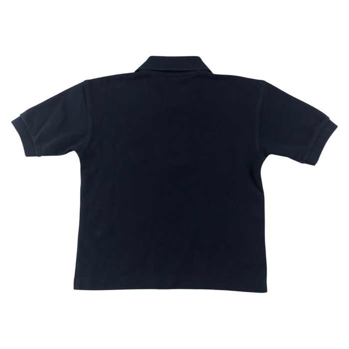 Second-hand Battlefield Primary School navy blue polo shirt, flat lay view with embroidered badge.