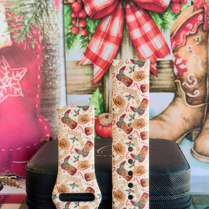 Close-up of both Boot Scootin' Christmas Samsung Galaxy Watch band straps with cowboy boots, hats and candy canes on cream