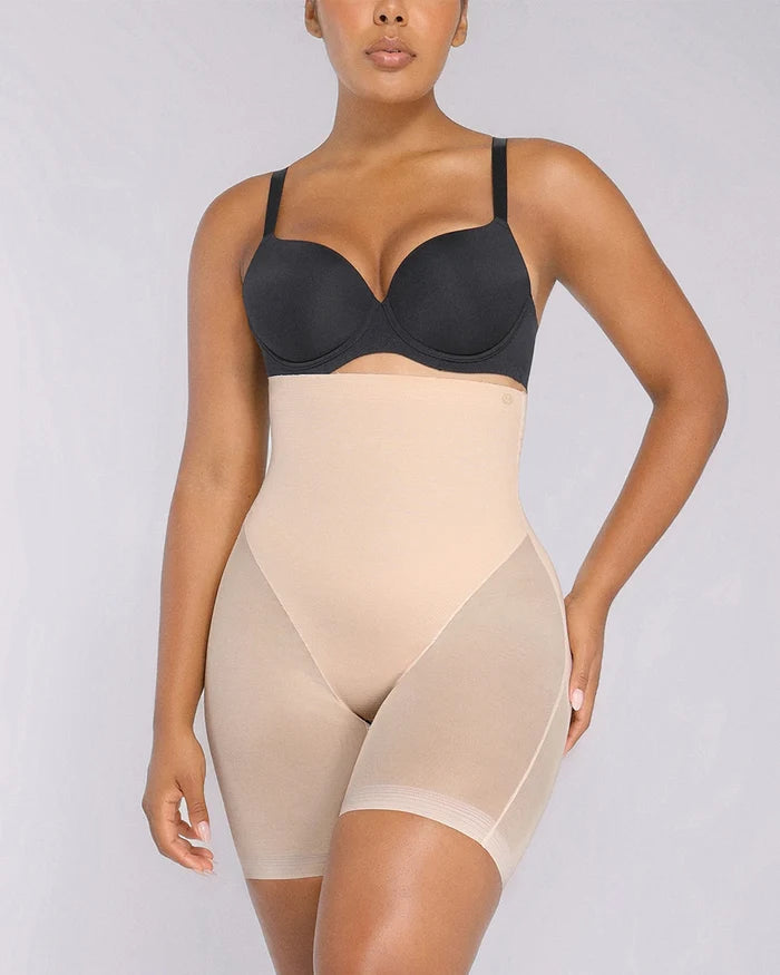 Model wearing black high-waisted mesh shaping shorts with butt-lifting support
