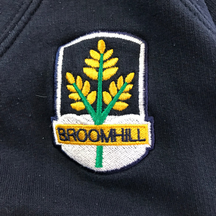 Second-hand Broomhill Primary boys navy V-neck school sweatshirt, flat lay view with embroidered school badge.