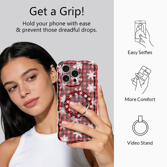 Woman taking a selfie while holding an iPhone by the Buffalo Plaid Snowflake grip ring; easy selfies, more comfort and video stand