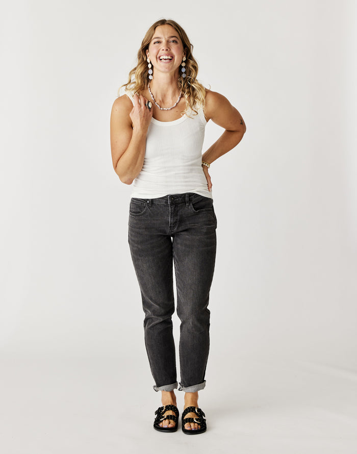 Carson Jean Washed Black mid-rise relaxed boyfriend denim with slight stretch and raw hem shown cuffed