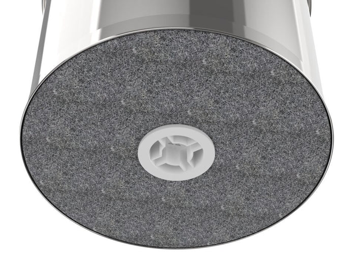 Close-up of a textured gray surface with a circular white logo on a white background