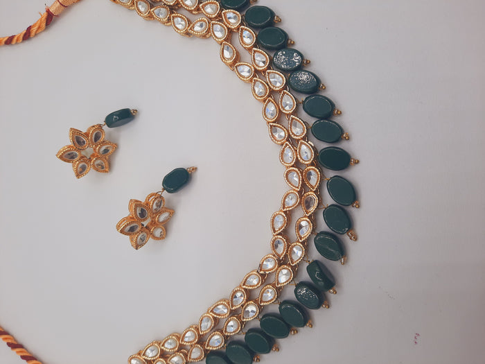 Flower shape gold plated kundan adjustable necklace with earrings in red and green color - NATASHAHS