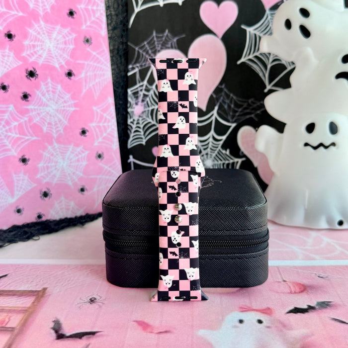 Hey Boo, Looking Cute silicone Apple Watch band displayed upright against a pink spiderweb and ghost backdrop.