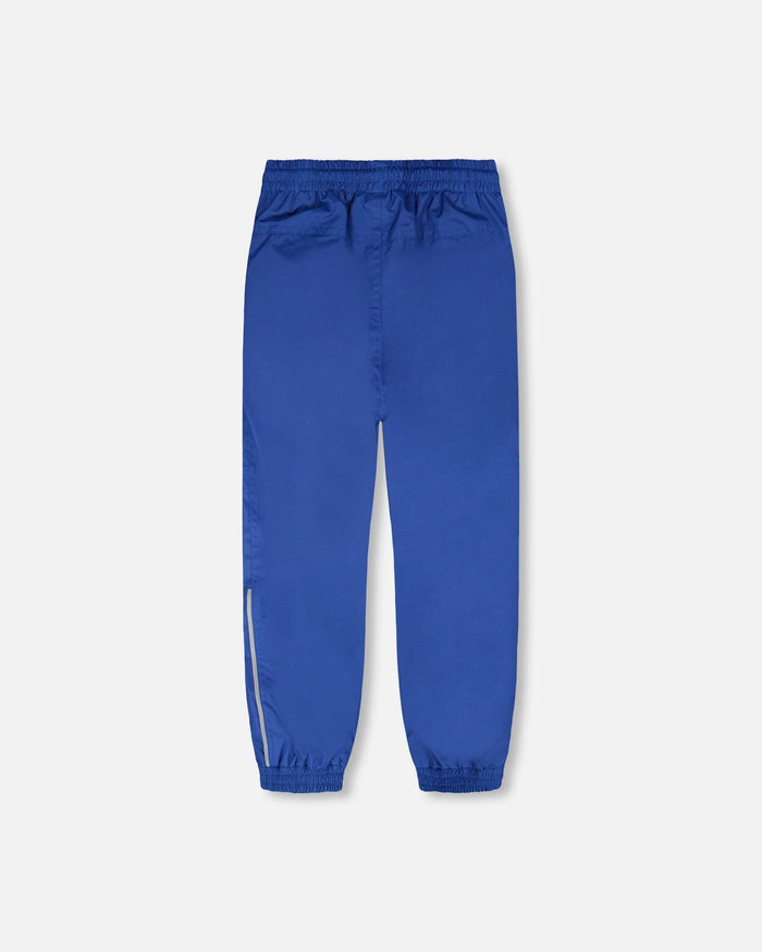 Deux par Deux boys' insulated mid-season set, blue and brown gradient jacket with blue pants – pants, front view