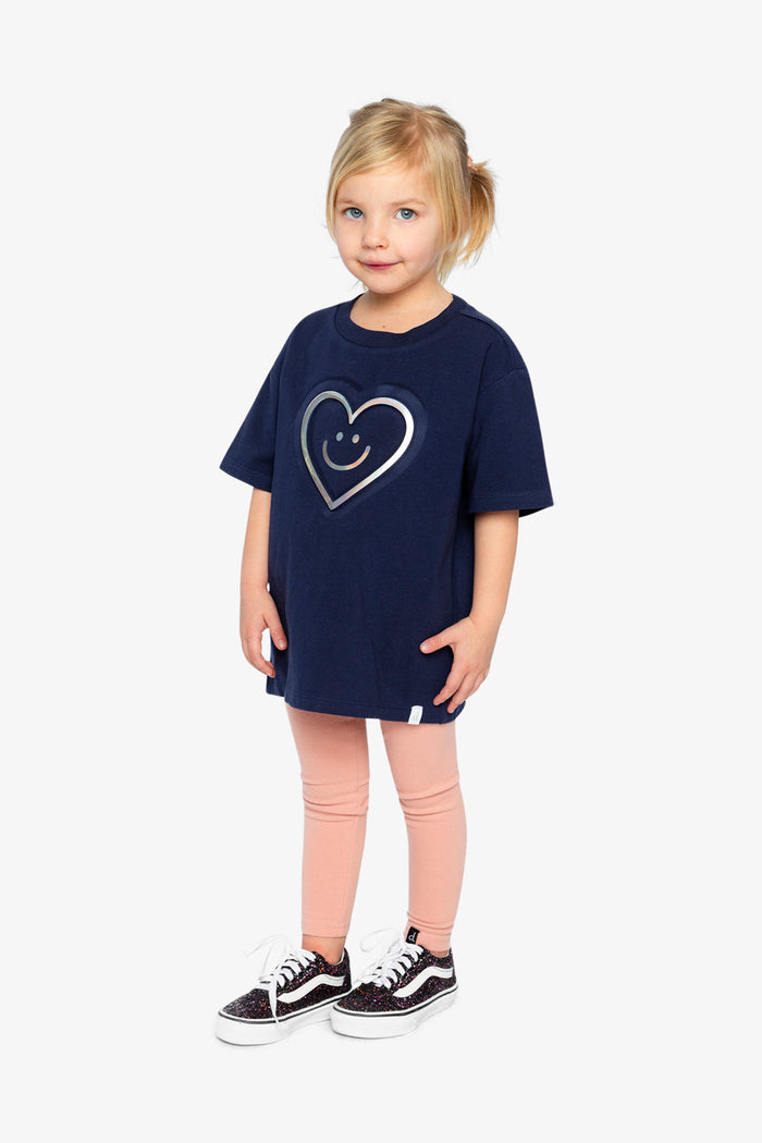 Deux par Deux girls' dark blue jersey T-shirt with holographic heart – full-length look on a child model