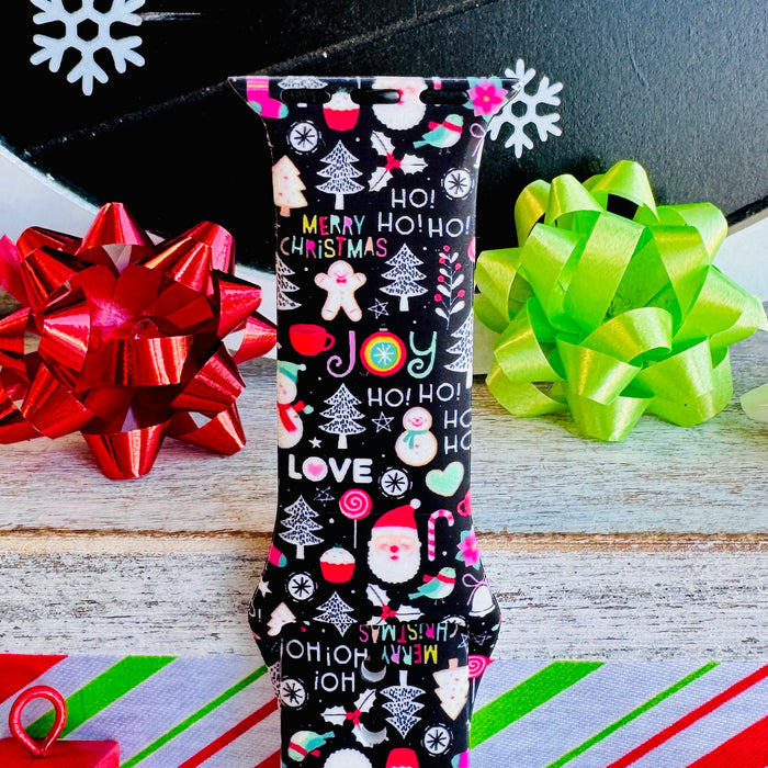 Jolly Wrist-mas silicone Apple Watch band strap up close, showing Santa, snowmen and candy canes on black