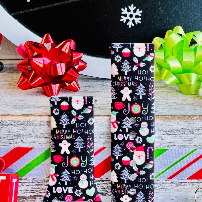 Close-up of the Jolly Wrist-mas Samsung Galaxy Watch band straps with red and green bows