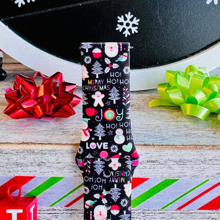 Jolly Wrist-mas silicone Samsung watch band straps up close, black with Santa, trees and HO HO lettering