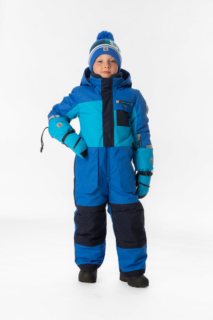 Child wearing the light and dark blue Deux par Deux PLAY one-piece snowsuit, front view