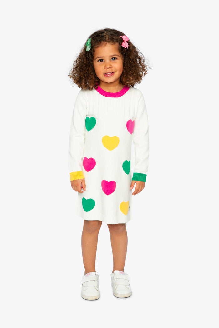 Deux par Deux girls' heart jacquard knit dress in off-white, green and pink – worn by a child model, full length