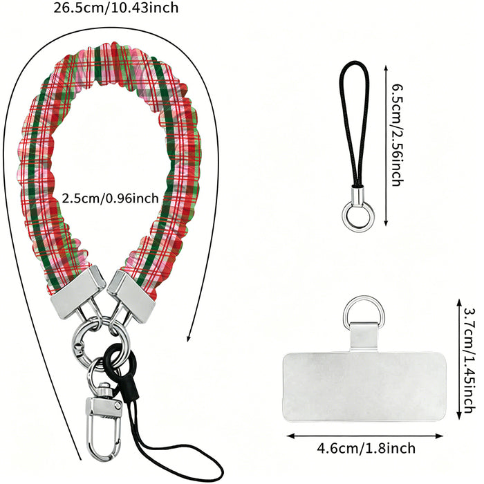 Merry Little Plaid scrunchie wrist strap dimensions: 26.5 cm strap, 2.5 cm wide, 6.5 cm loop, 4.6 x 3.7 cm phone tab