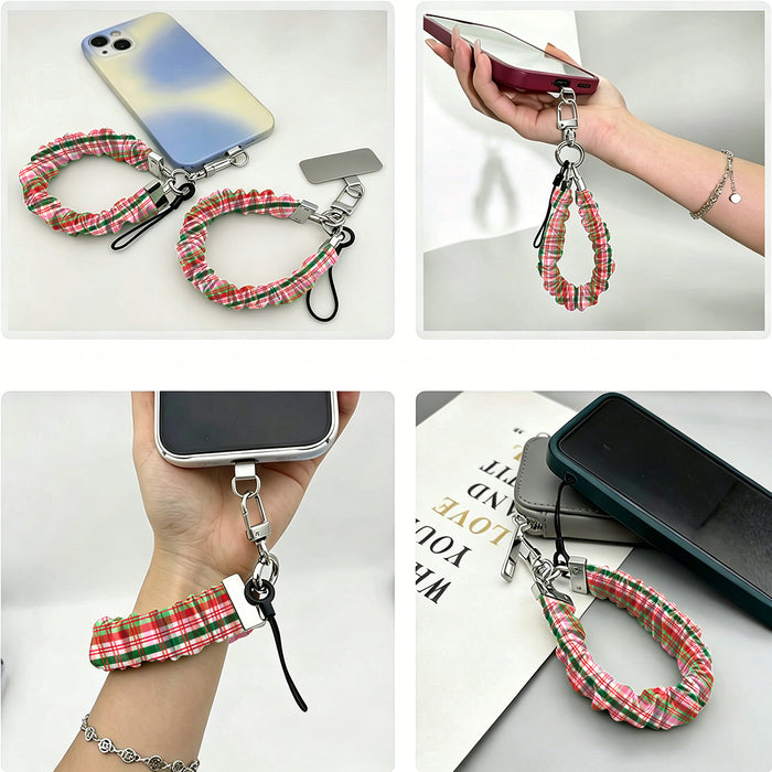 Four views of the Merry Little Plaid scrunchie phone wrist strap: with its phone tab, dangling from a phone in hand, worn on the wrist, and clipped to a pouch zipper