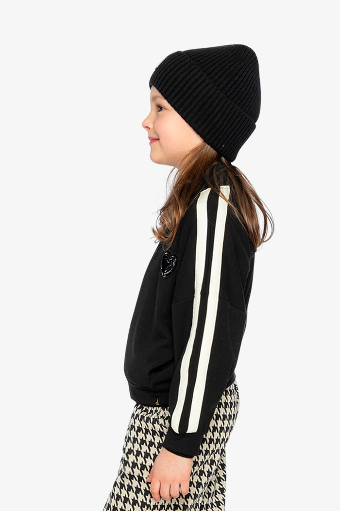 Child wearing the Deux par Deux black milano zip jacket, view 4