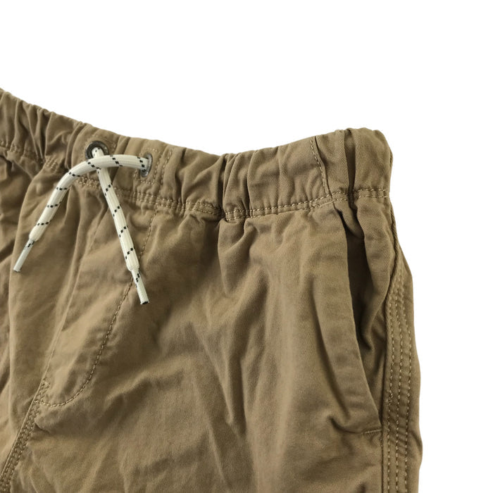Next 9 years beige plain pull up cotton shorts