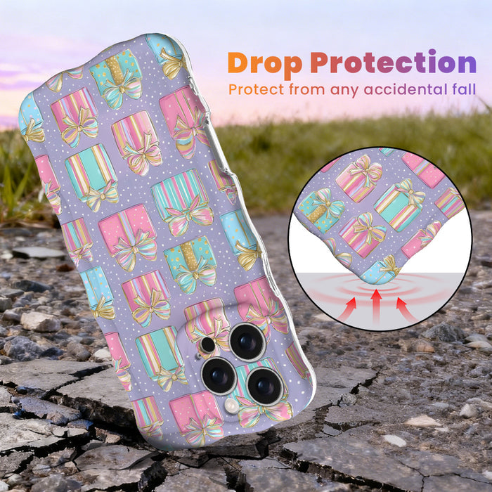 No Peeking, Darling Wavy Luxe MagSafe iPhone case with pastel Christmas presents on lavender, with shock-absorbing corners for drop protection