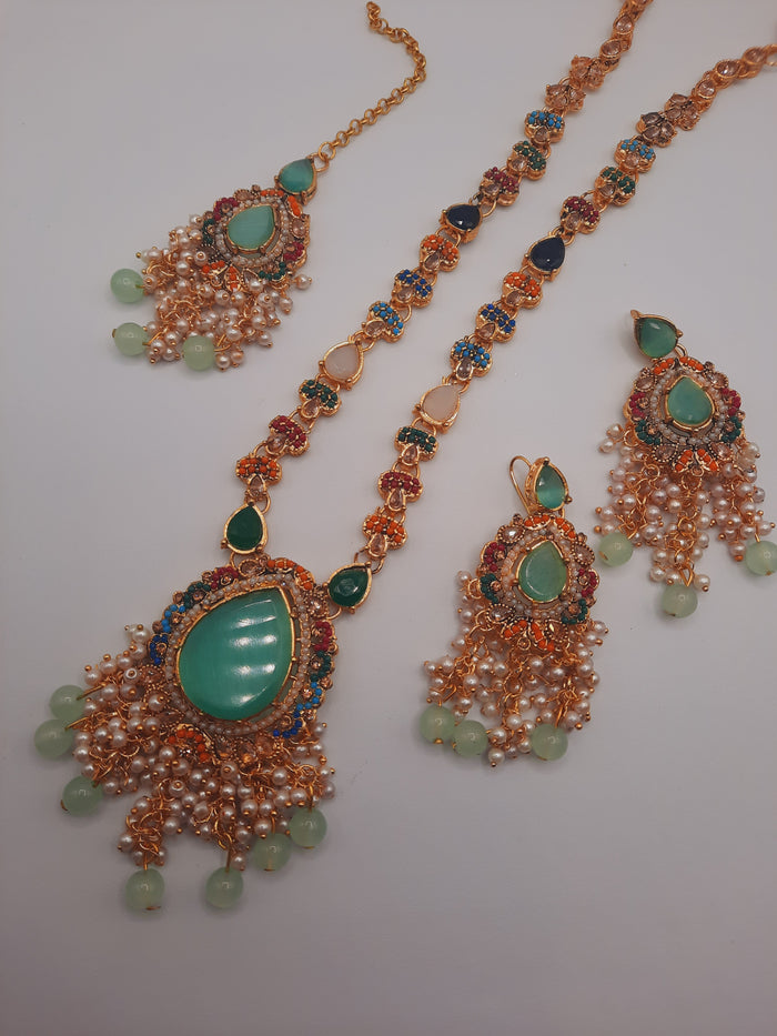 Noratan Kundan maala set with earrings and teeka for modern brides in black and green shades - NATASHAHS