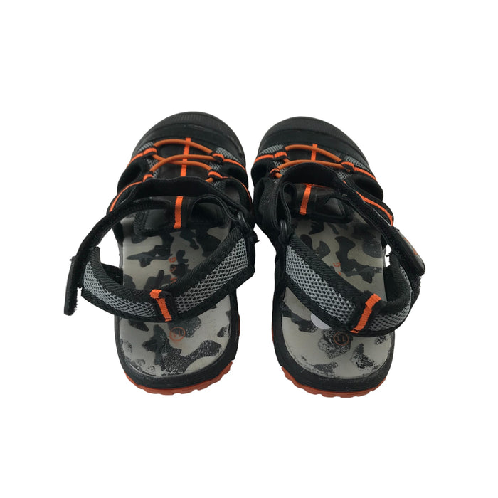Nutmeg size UK 11 (jr) black orange walking sandals