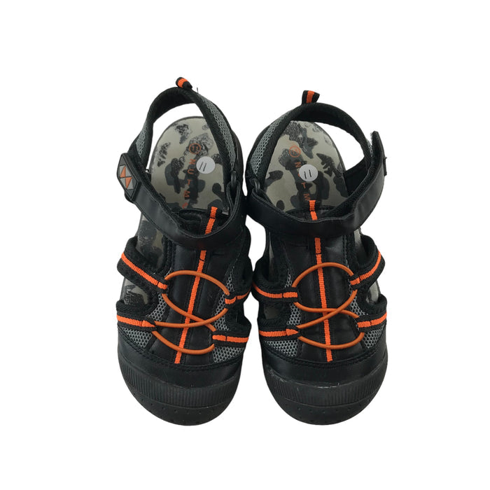 Nutmeg size UK 11 (jr) black orange walking sandals