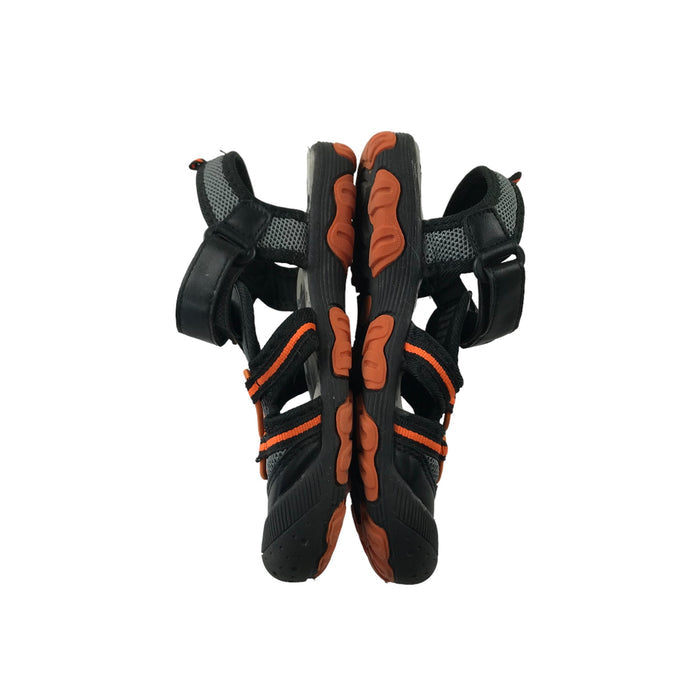 Nutmeg size UK 11 (jr) black orange walking sandals