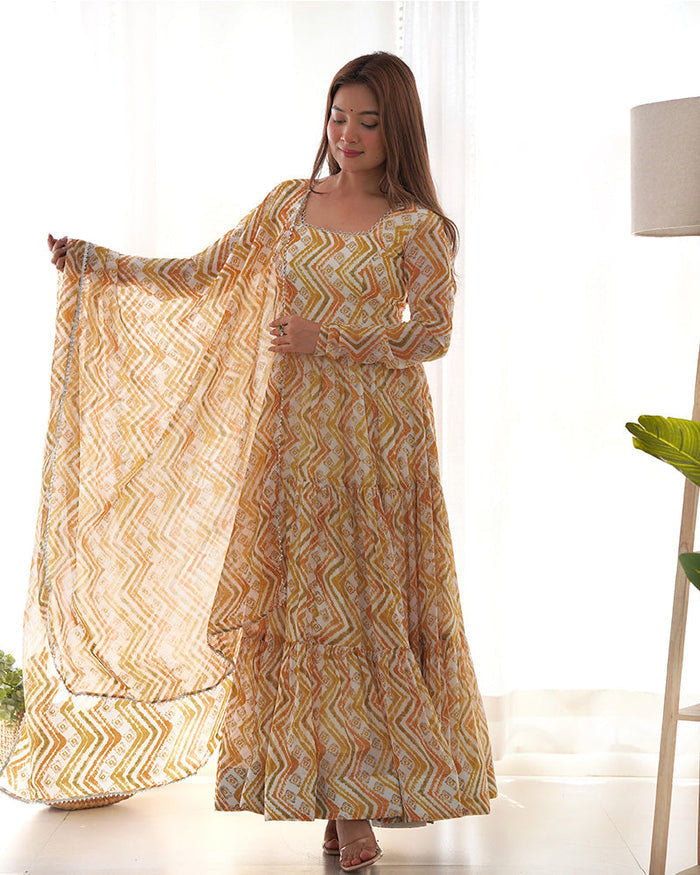 OFF-WHITE COLOR SOFT GEORGETTE THREE LAYER RUFFLE STYLE ANARKALI SUIT