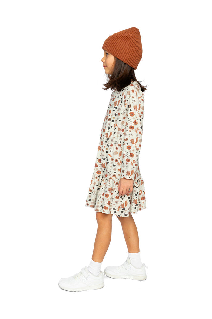 Child wearing Deux par Deux organic cotton dress, beige squirrel print, lookbook view 2