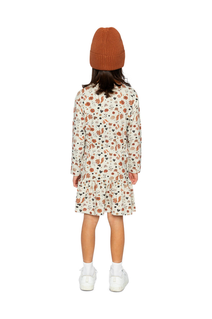 Child wearing Deux par Deux organic cotton dress, beige squirrel print, lookbook view 3