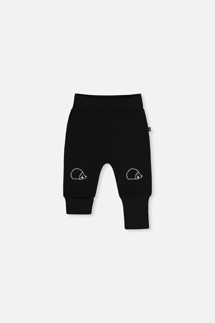 Deux par Deux baby boys evolutive pants, black and brown with hedgehog details, front view