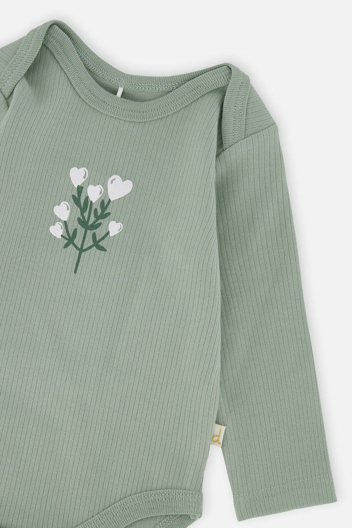 Close-up detail of the Deux par Deux organic cotton onesie in greyish green with flower detail, view 4