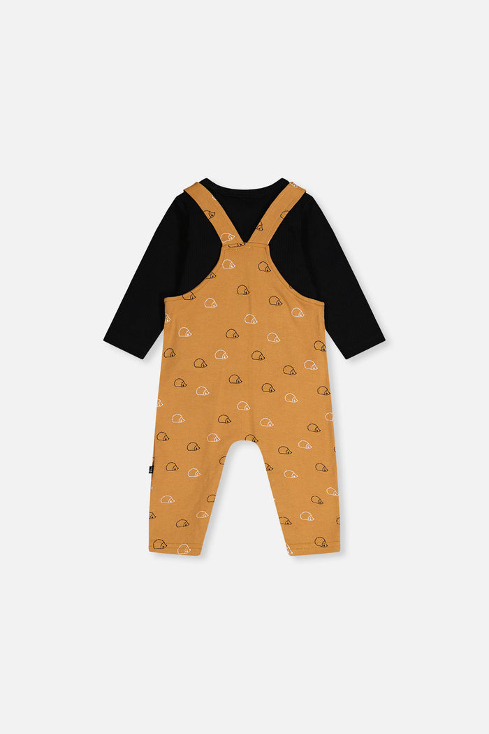 Deux par Deux baby boy organic cotton set with black onesie and brown hedgehog-print overalls, back view