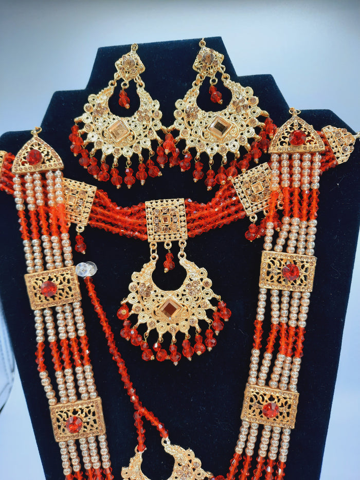 Red guluband choker with earrings and teeka