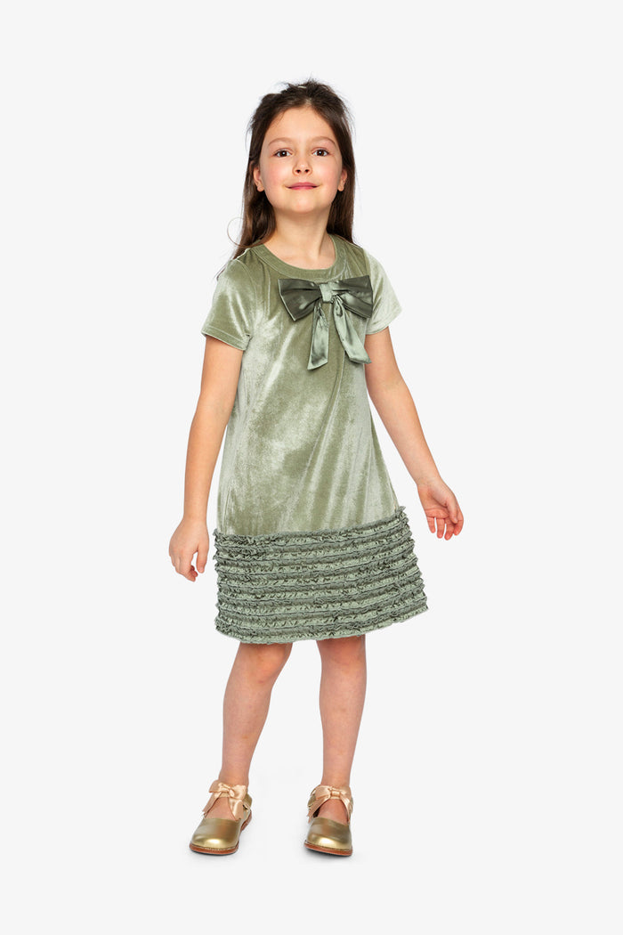 Girl wearing the Deux par Deux greyish green velour dress with bow, lookbook photo 1