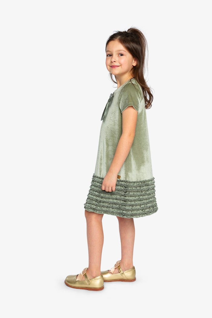 Girl wearing the Deux par Deux greyish green velour dress with bow, lookbook photo 2