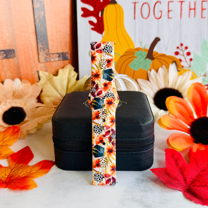 Sienna Petals Samsung Galaxy Watch band standing full length in front of a Gather Together fall sign with pumpkins and sunflowers.